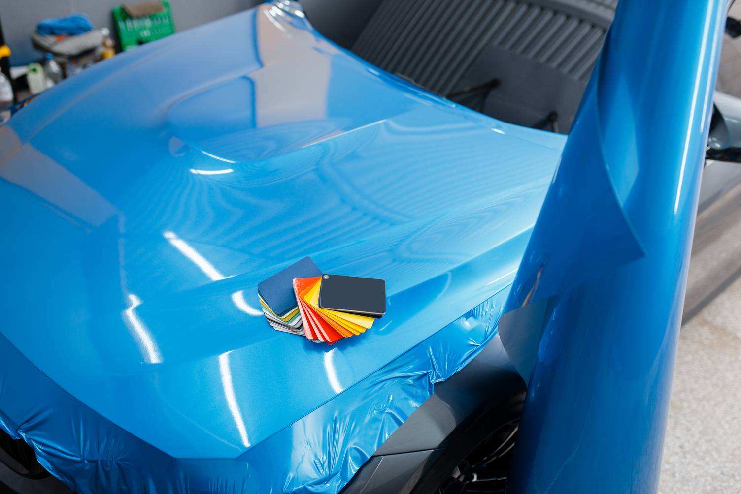 Car wrapping, protective vinyl foil or film color palette on the vehicle, nobody. Auto detailing. Automobile paint protection, professional tuning